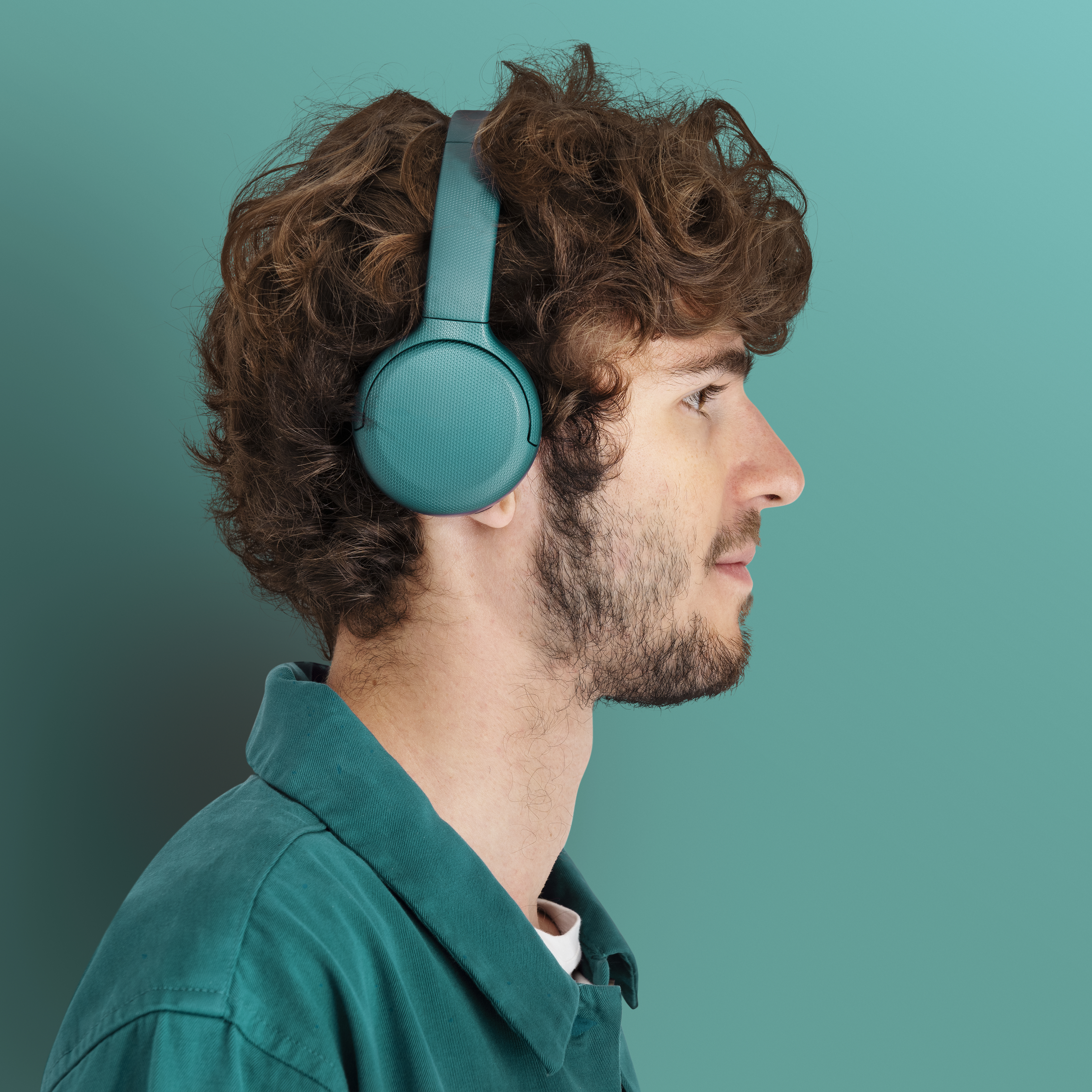 Man mockup listening to music using headphones Pinterest banner